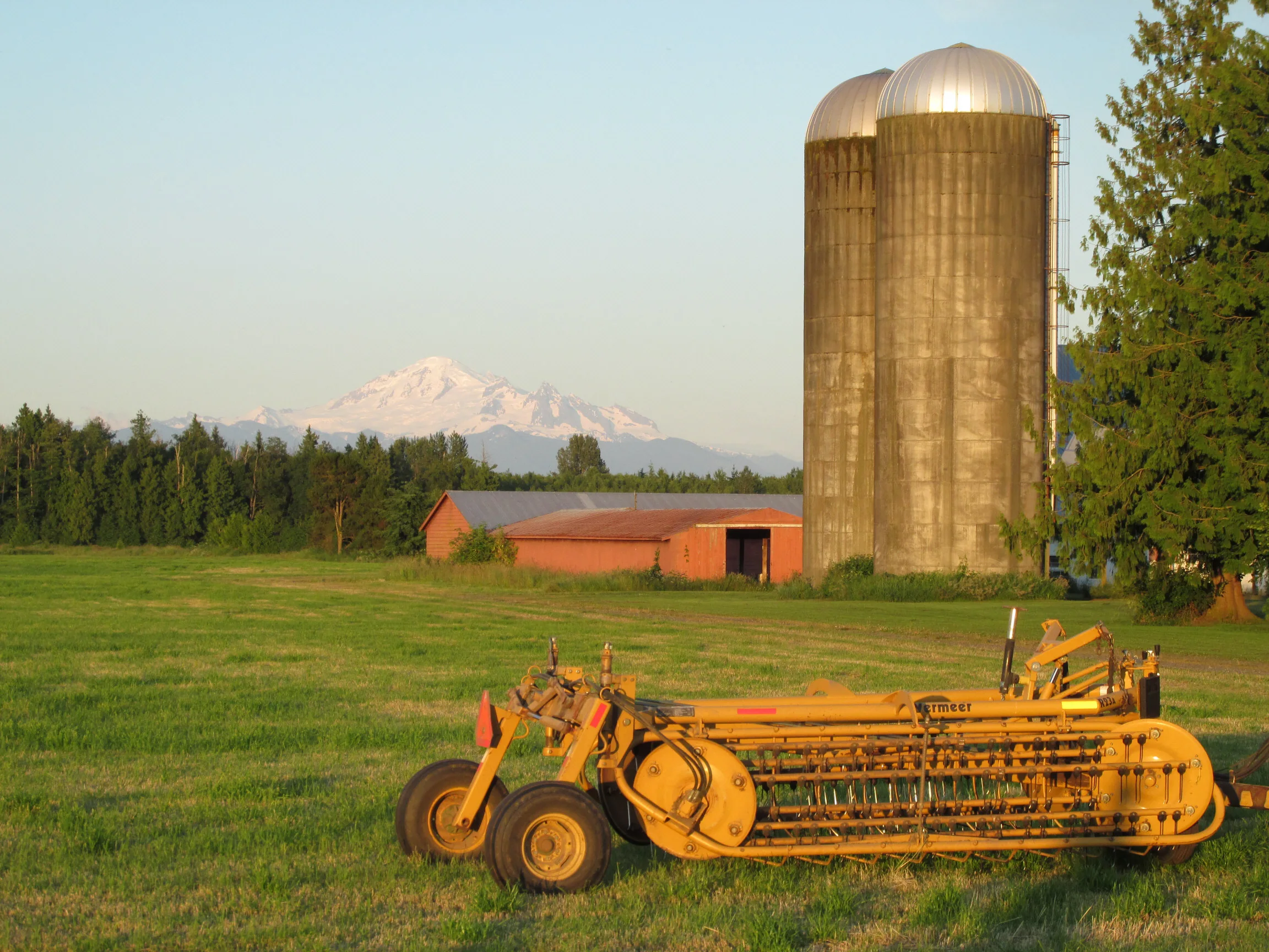 A Whatcom County farm with Mount Baker at sunset